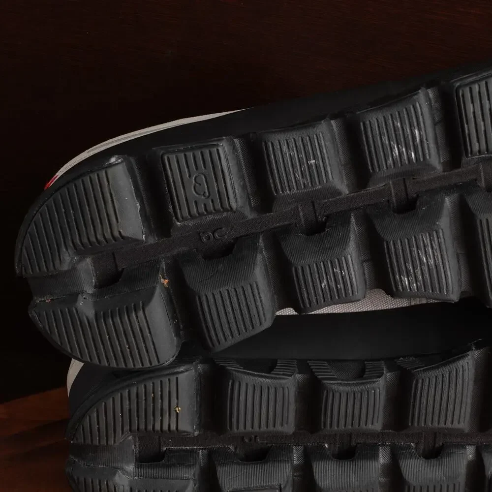 On Running Men's Athletic Shoes in White and Black